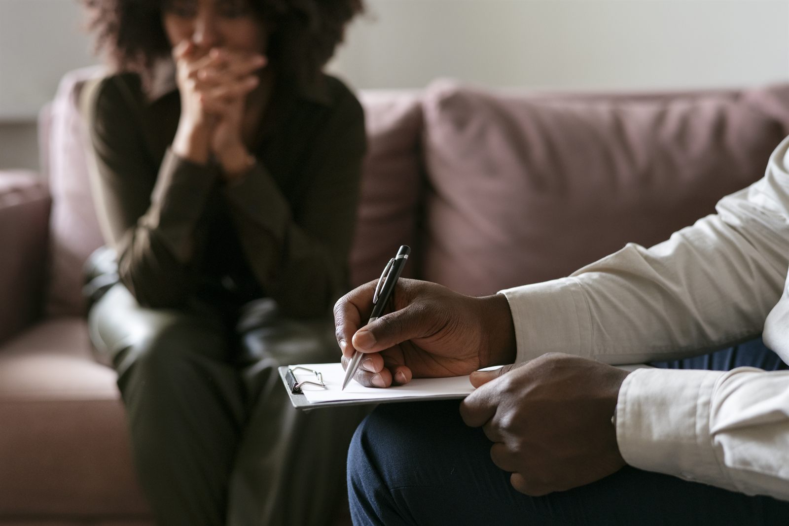 Licensed clinical social worker (LCSW) meeting with a client during a one-on-one therapy session